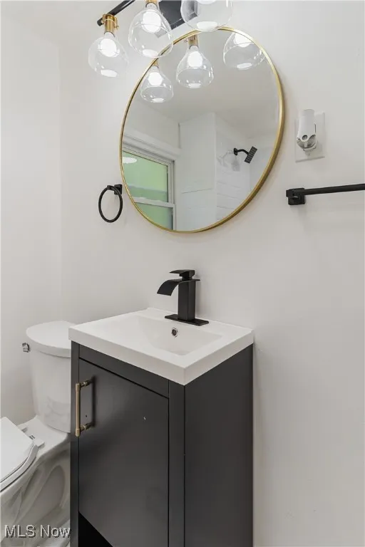Bathroom with vanity and toilet