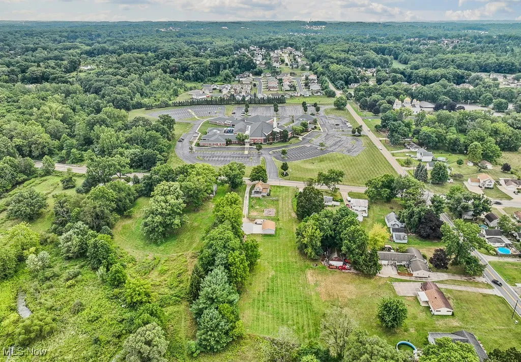 Drone / aerial view of a forest and abundant farmland