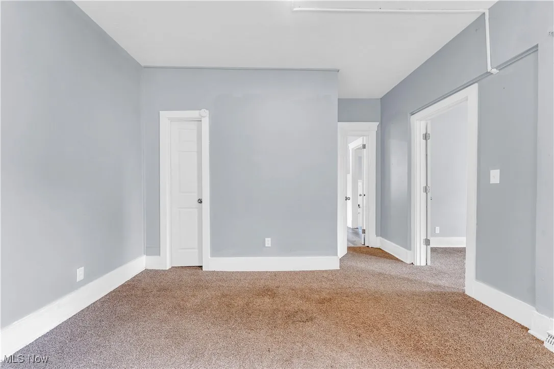 Spare room with carpet flooring