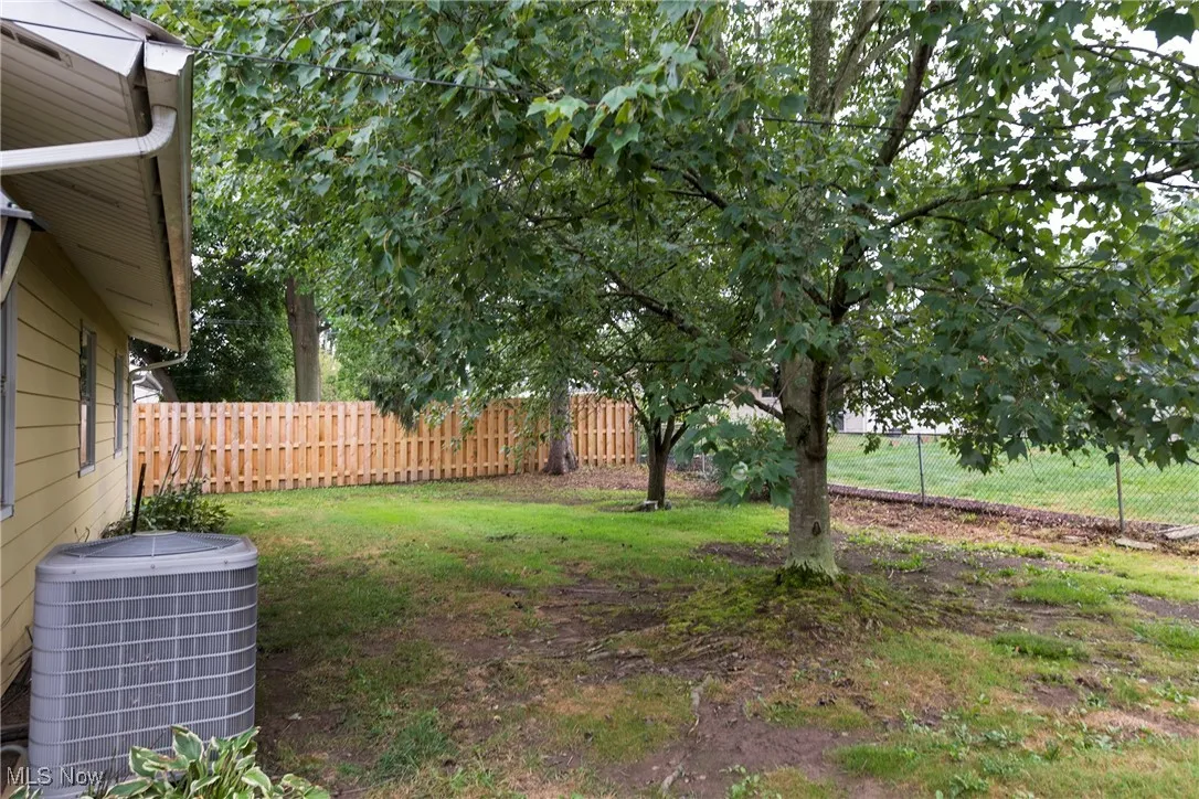 View of fenced backyard