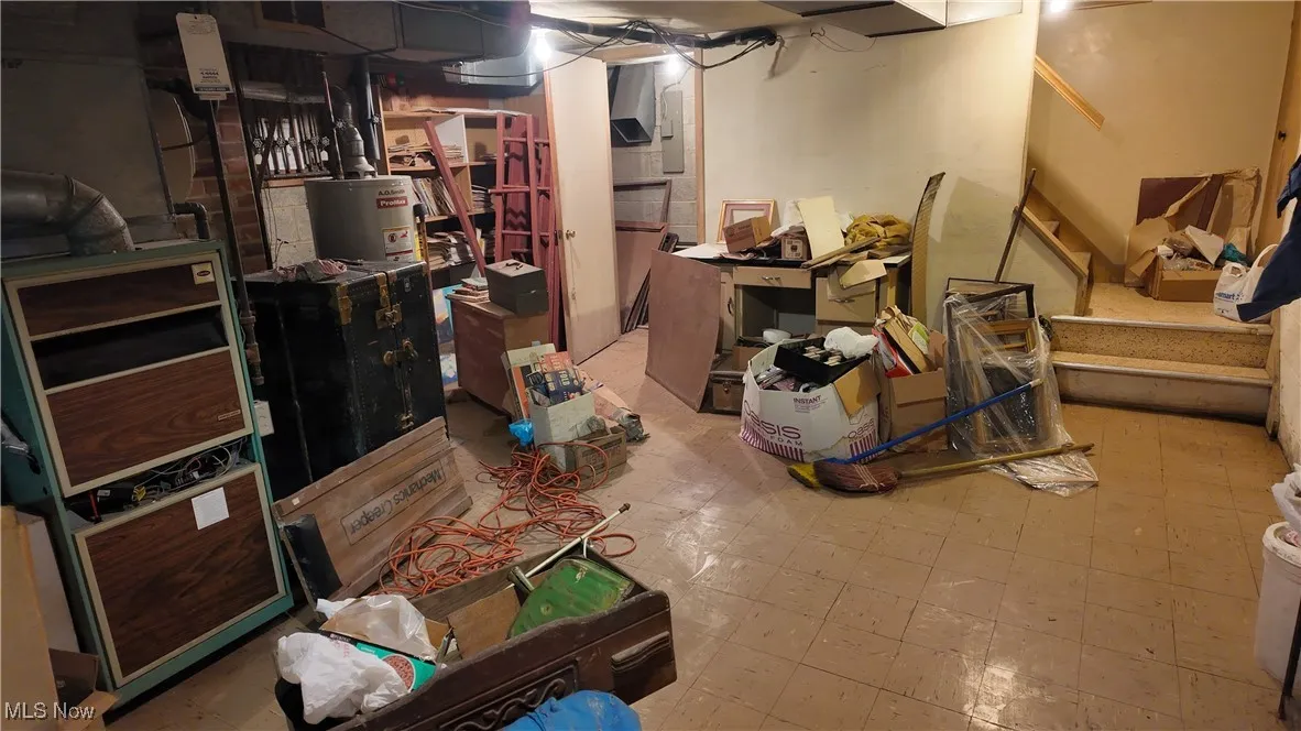 Unfinished below grade area featuring light floors