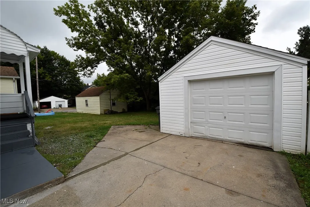 Detached garage with driveway