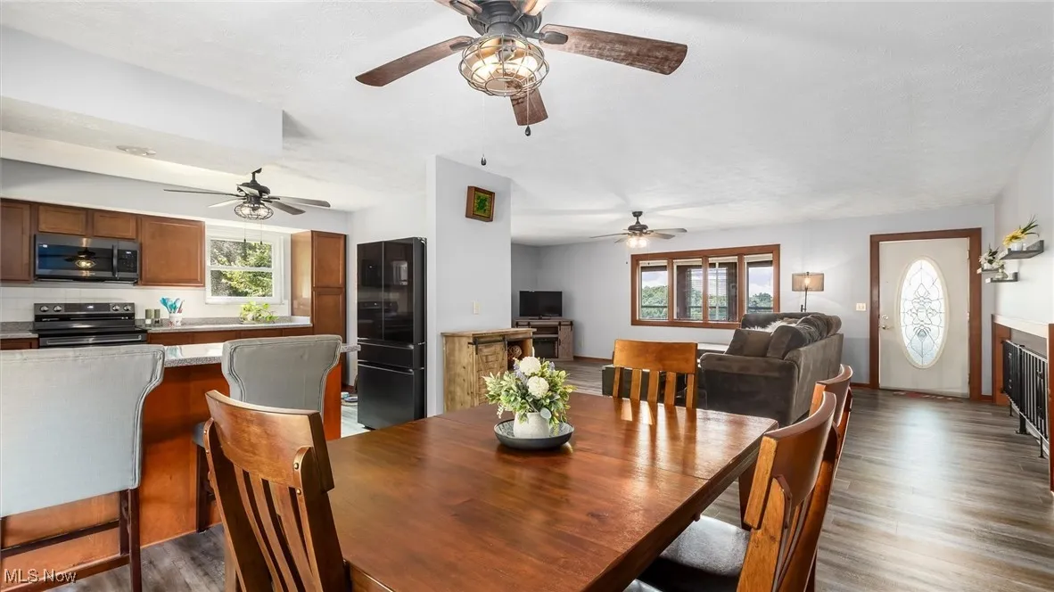 Dining space featuring wood finished floors