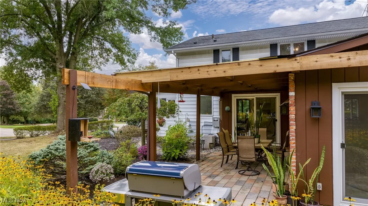 Deck with a patio and outdoor dining space