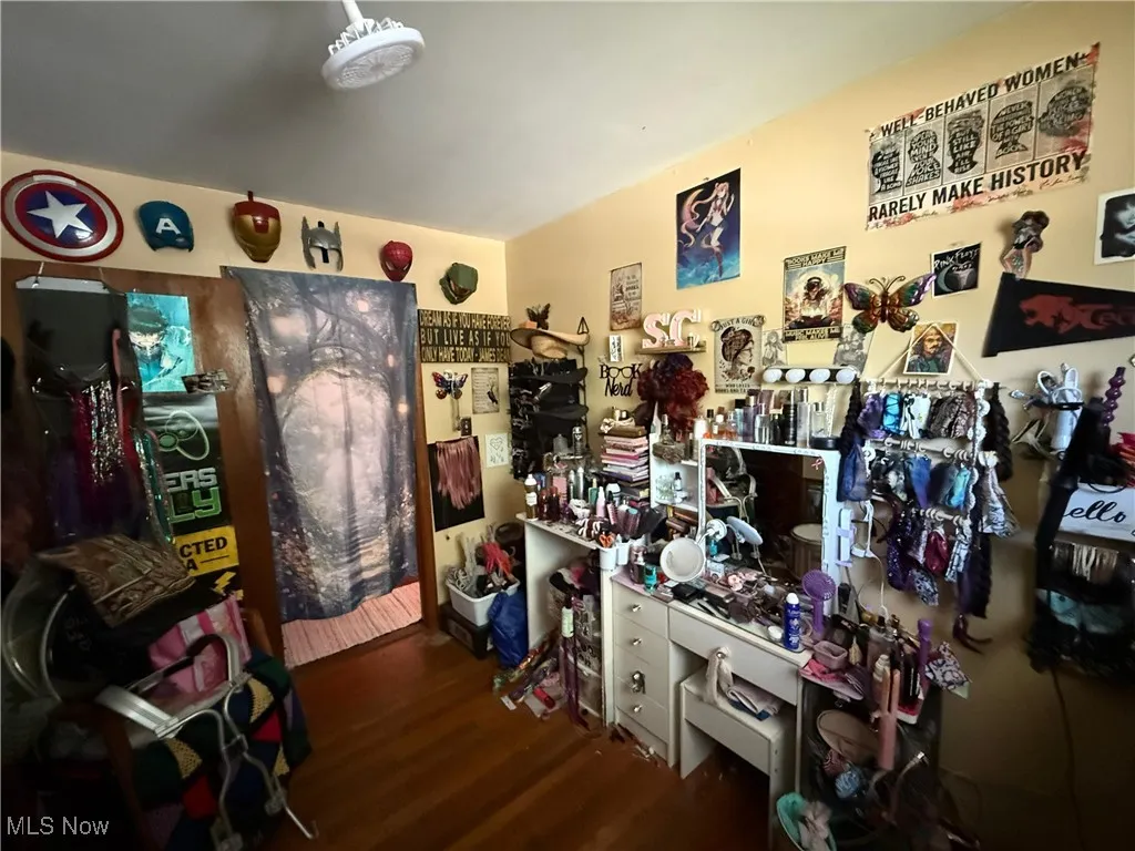 Misc room with dark wood-style floors