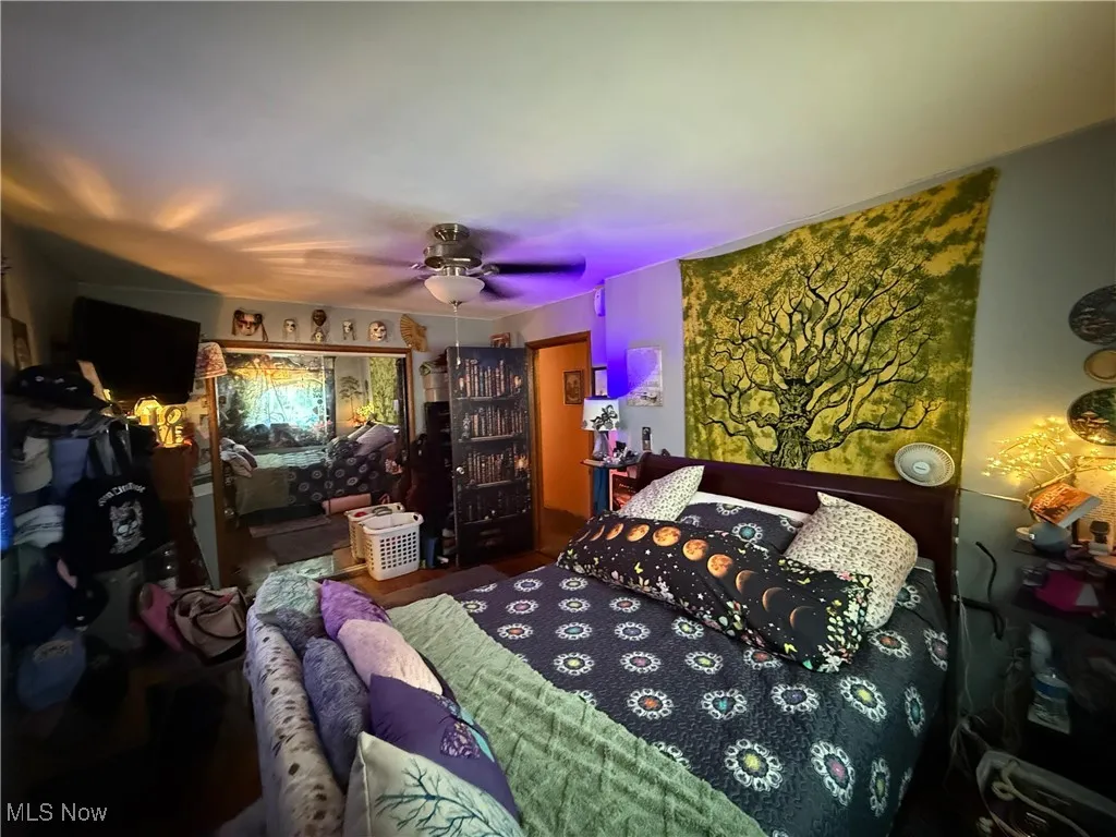 Bedroom featuring a ceiling fan