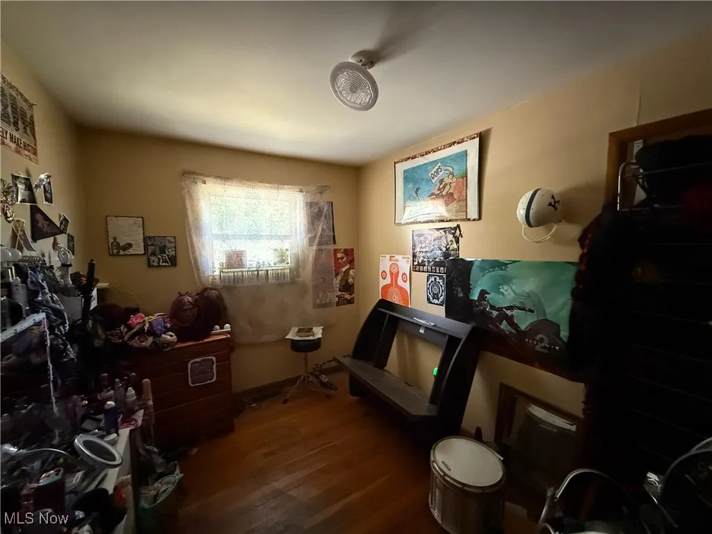 Miscellaneous room featuring dark wood-style floors