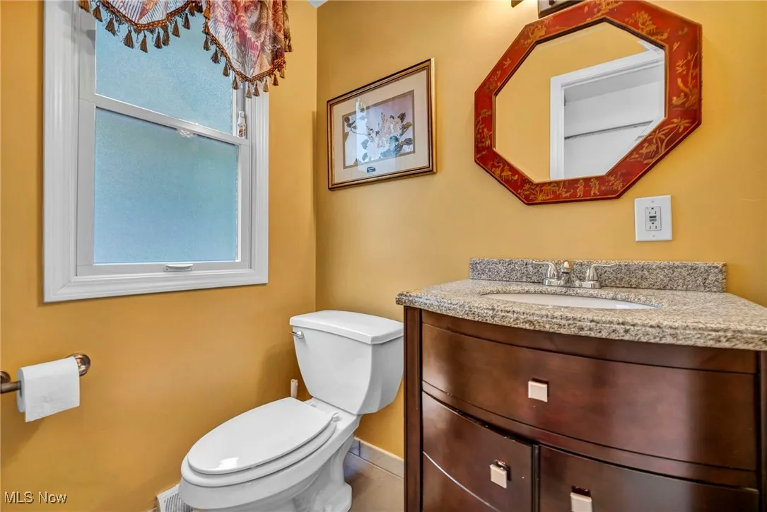 Bathroom with vanity and toilet