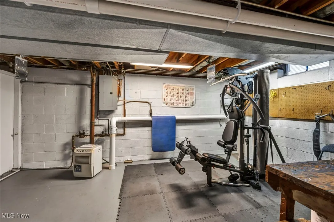 Workout area featuring electric panel