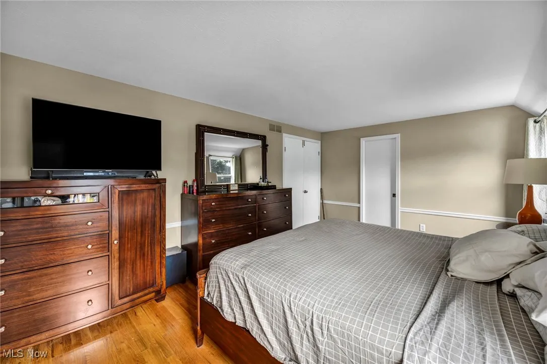 Bedroom featuring wood finished floors