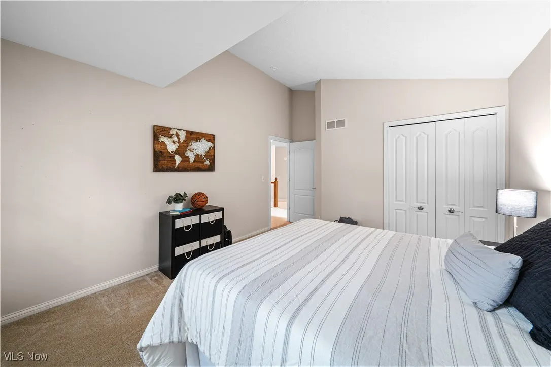 2nd first floor bedroom with vaulted ceilings.