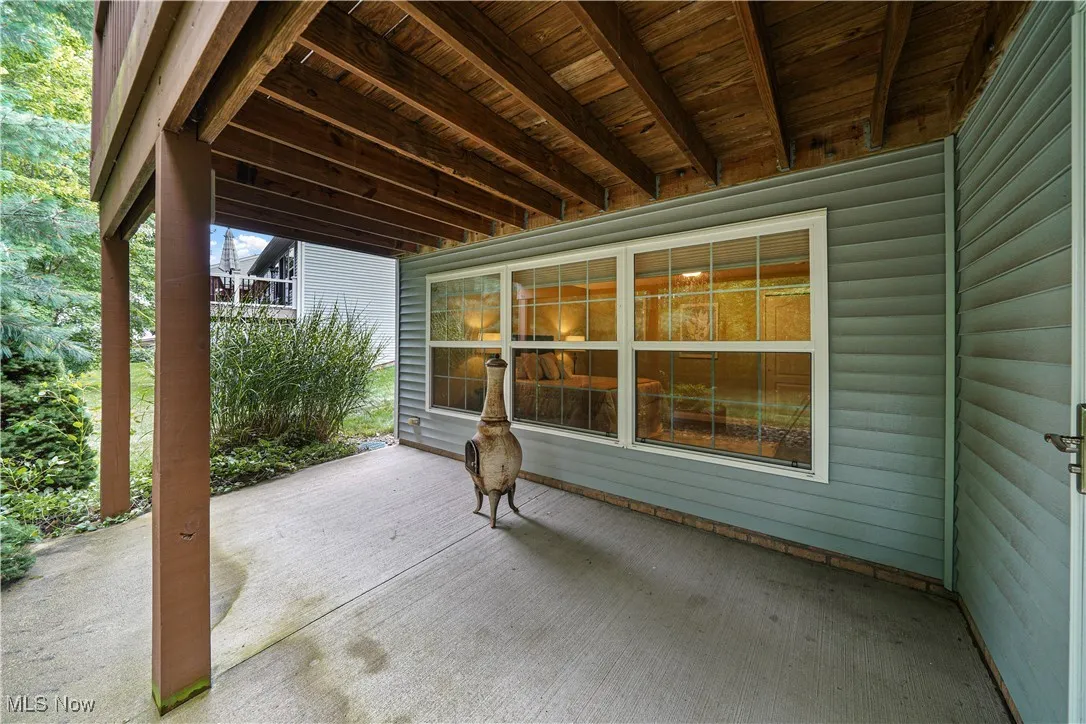 patio outside the lower level recreation room and bedroom.