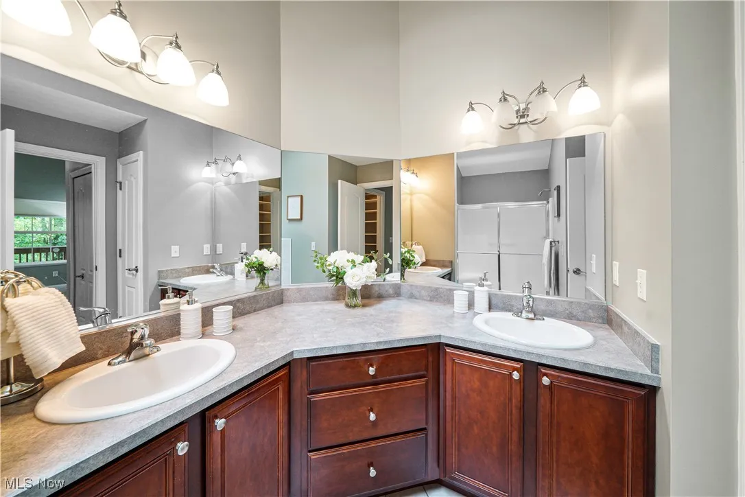 spacious master bathroom with double sinks