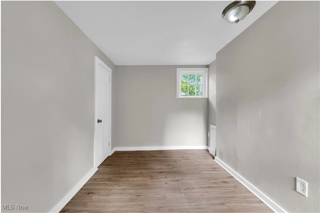 Empty room with light wood-style floors