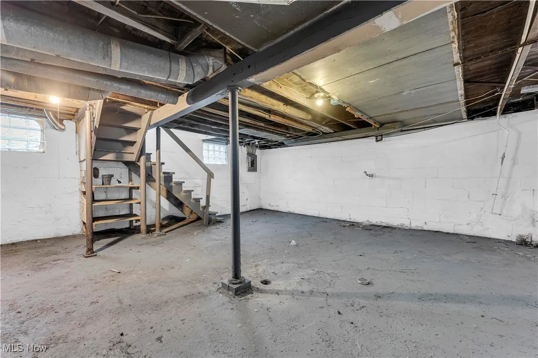 Below grade area featuring stairs and healthy amount of natural​​‌​​​​‌​​‌‌​‌‌​​​‌‌​‌​‌​‌​​​‌​​ light