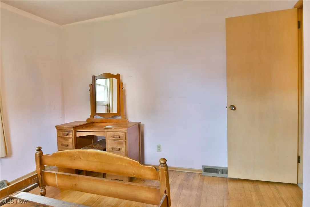 Bedroom featuring hardwood / wood-style flooring