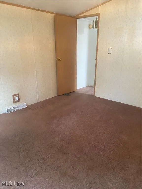 View of carpeted spare room