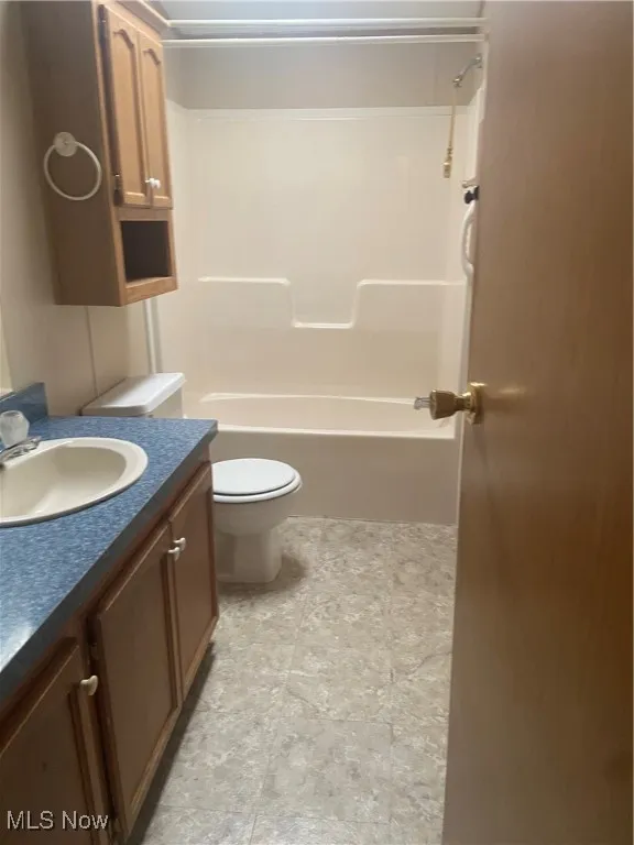 Full bath with vanity and shower / bathtub combination
