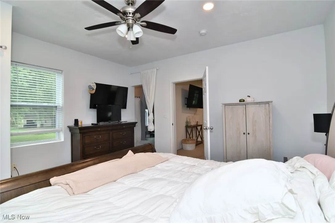 Bedroom featuring a ceiling fan and recessed lighting