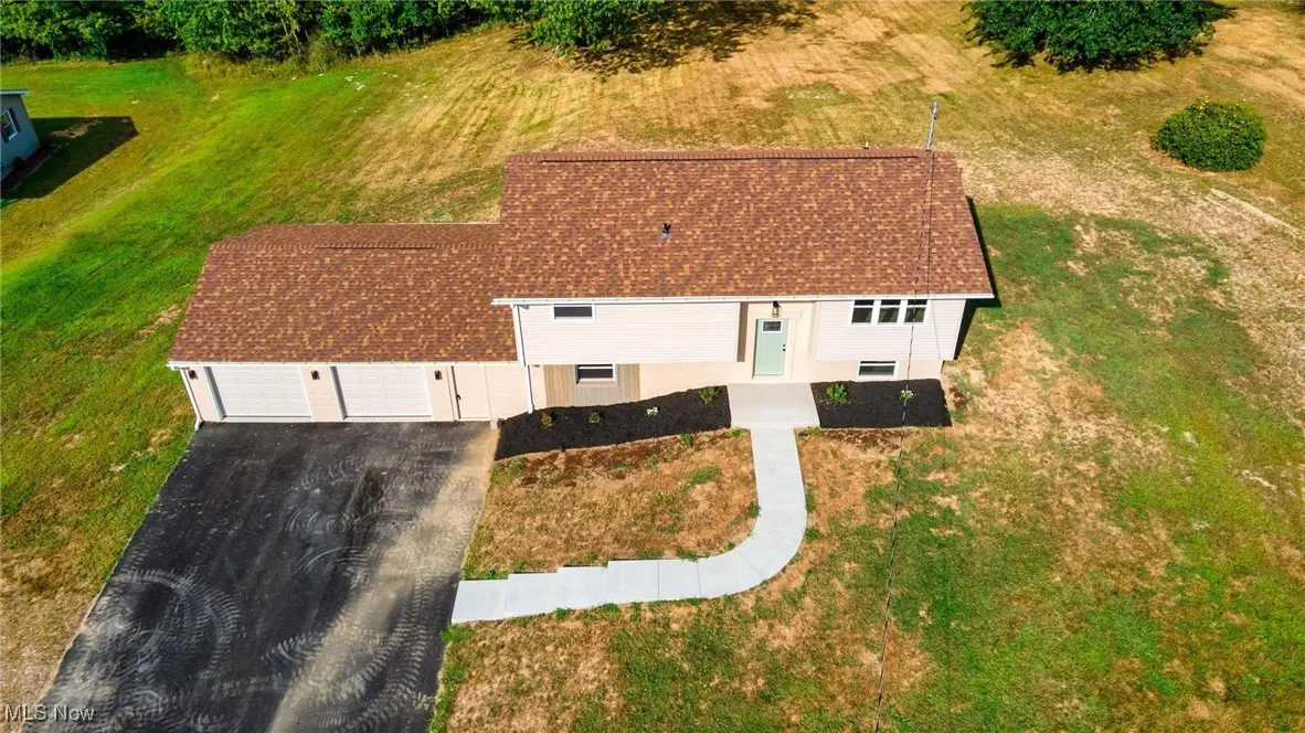 Aerial view of property and surrounding area