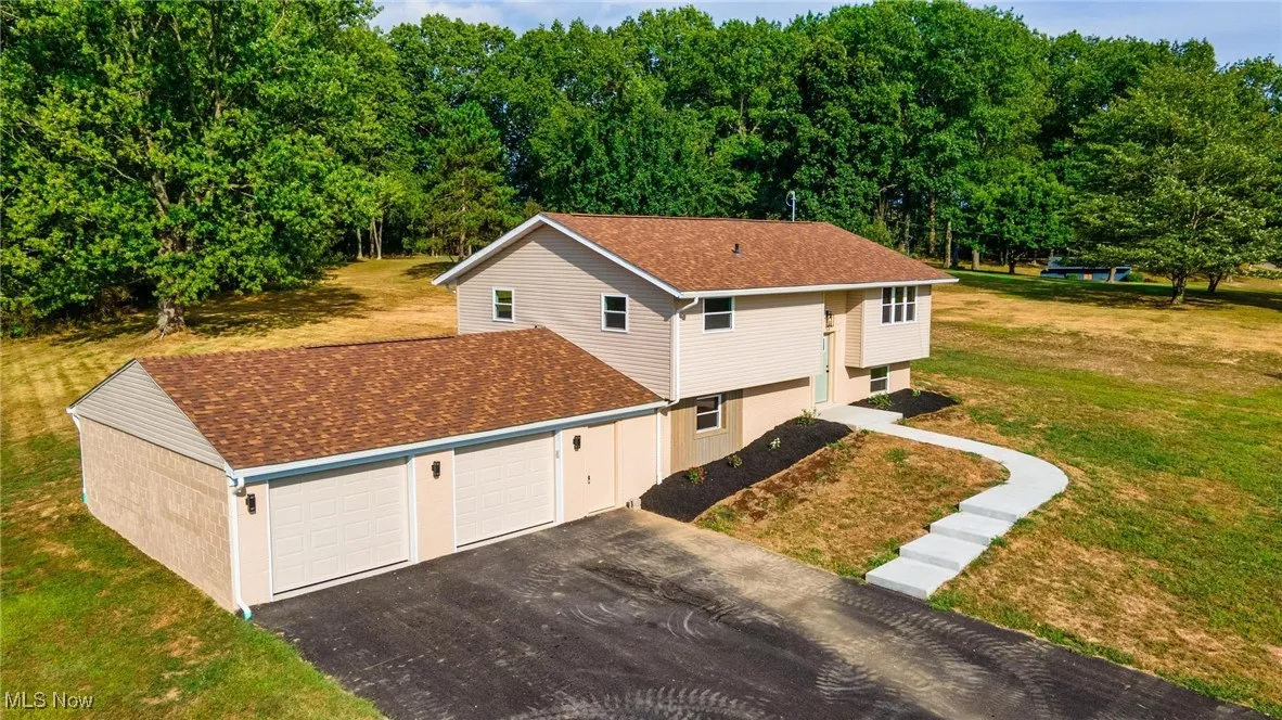 Aerial view of property and surrounding area