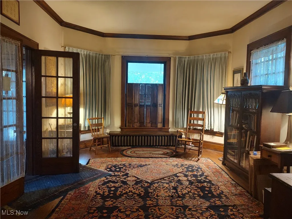 Formal Living area w/fireplace and French Doors