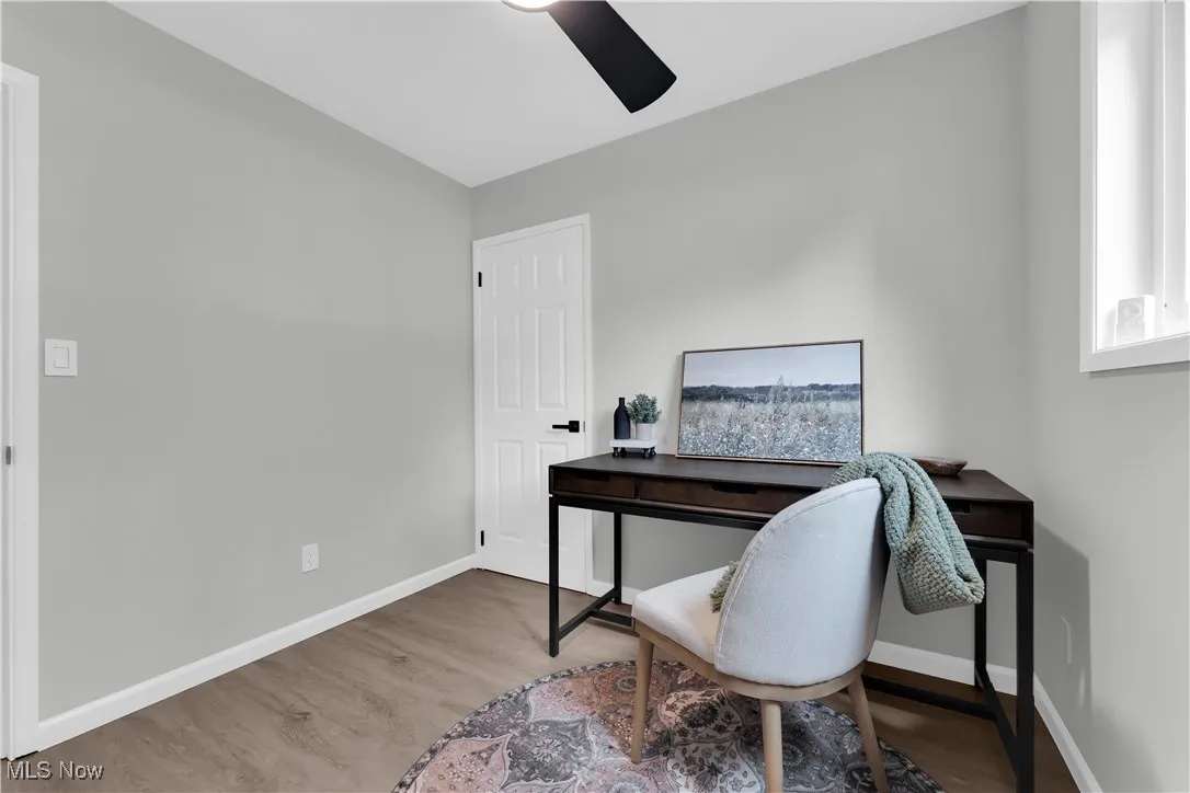 Office area featuring light wood finished floors and baseboards