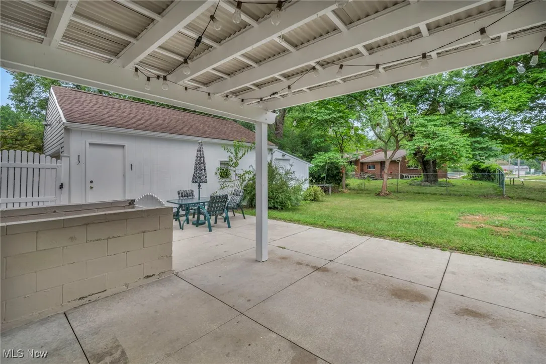 View of patio with outdoor dining space