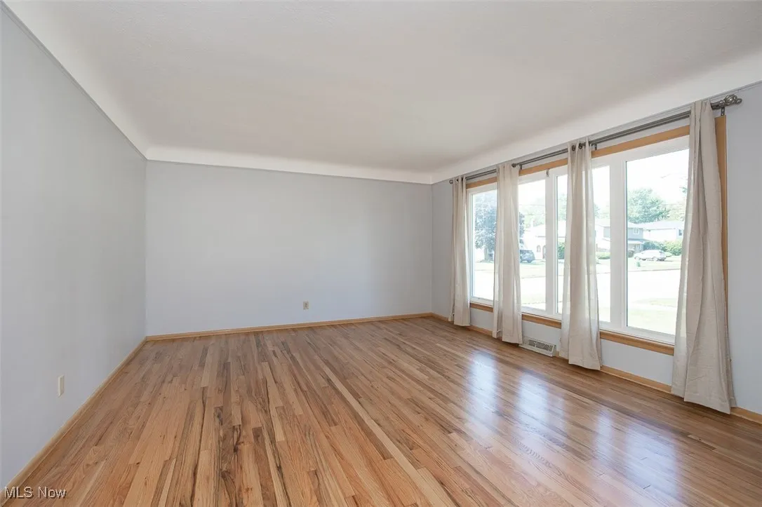 Living room overlooking picture windows.