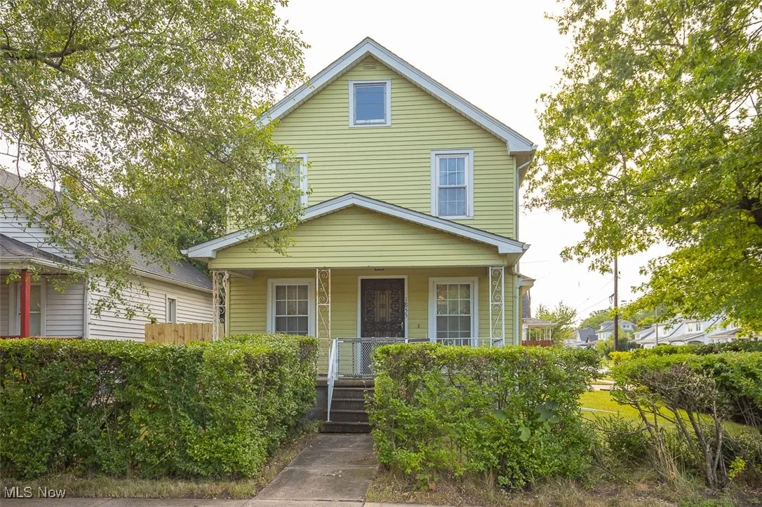 View of front facade with covered porch Main house