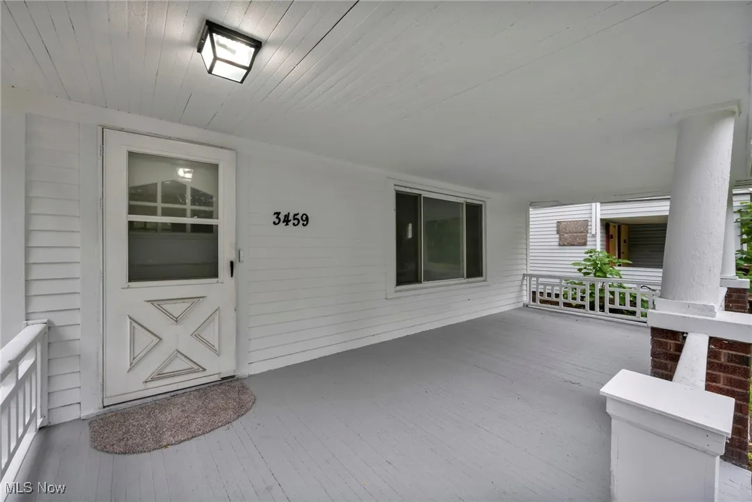 Entrance to property with a porch