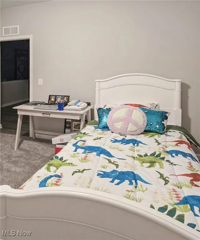Bedroom with carpet