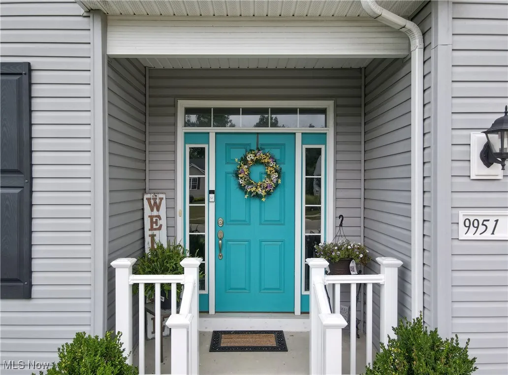 Property entrance with a porch