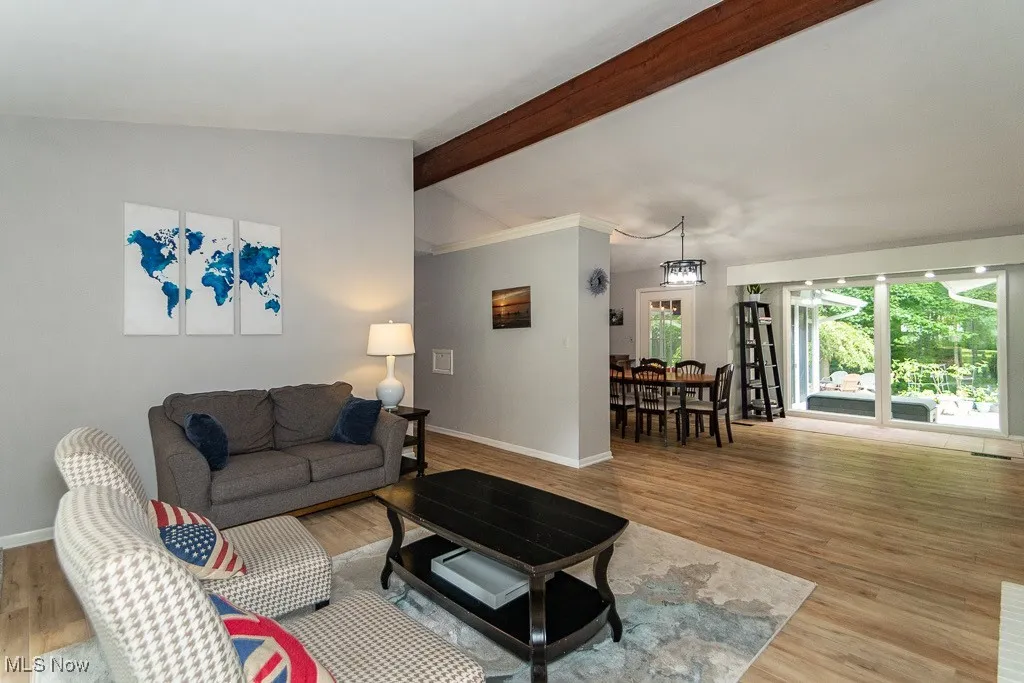 Living area with light wood-style flooring