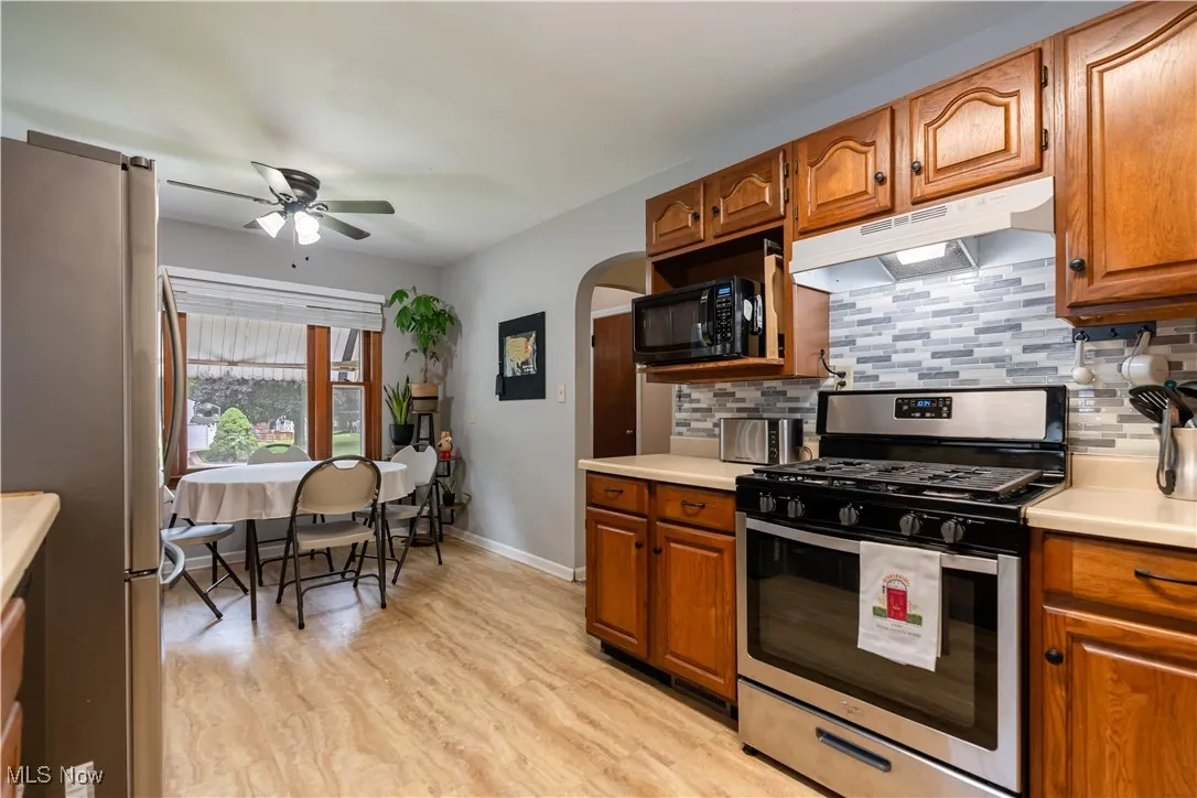 Stainless Steel and Black Kitchen Appliances convey