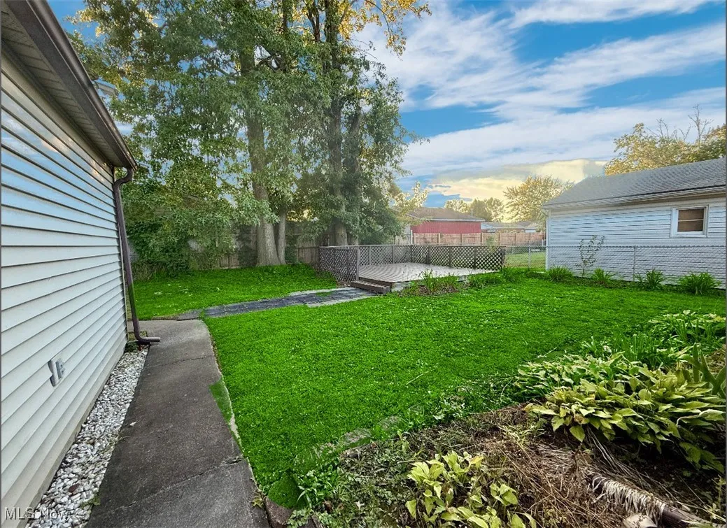 View of yard featuring a deck