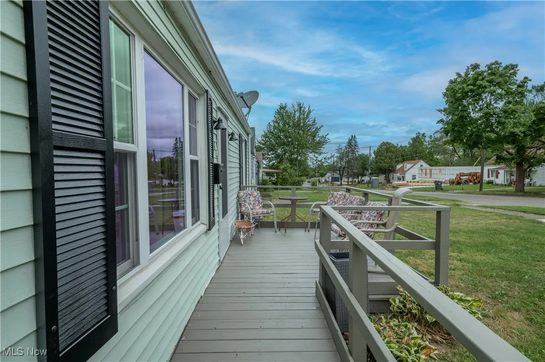 Deck featuring a yard