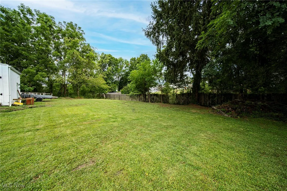 View of yard featuring view of wooded area