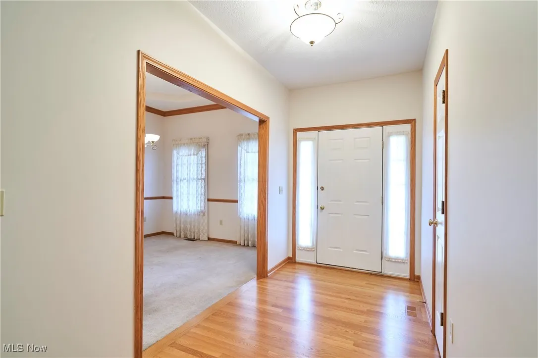 Entryway featuring  oak flooring