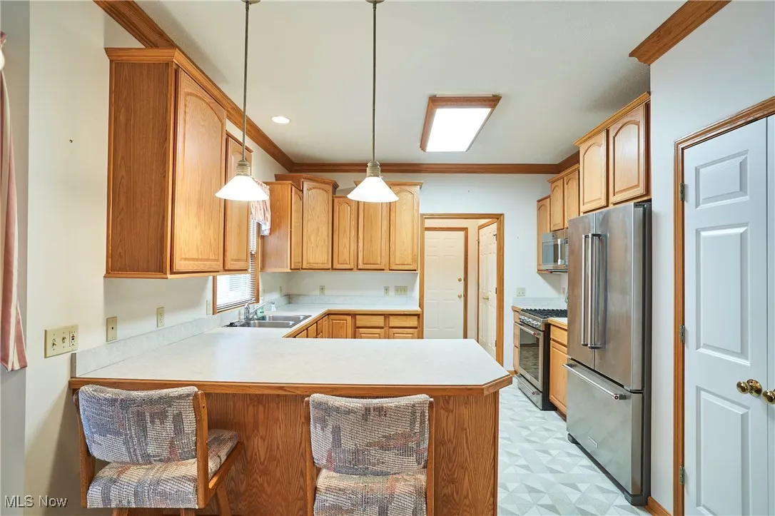 Kitchen bar area and double closet pantry