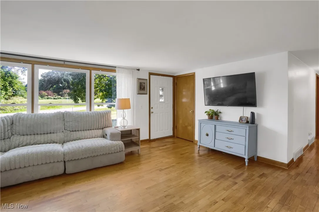 Living area featuring light wood-style floors