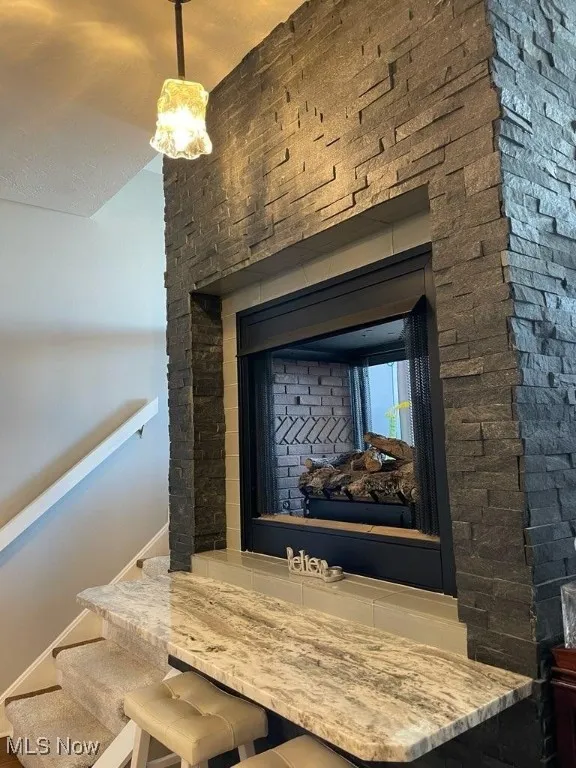 See thru stone fireplace