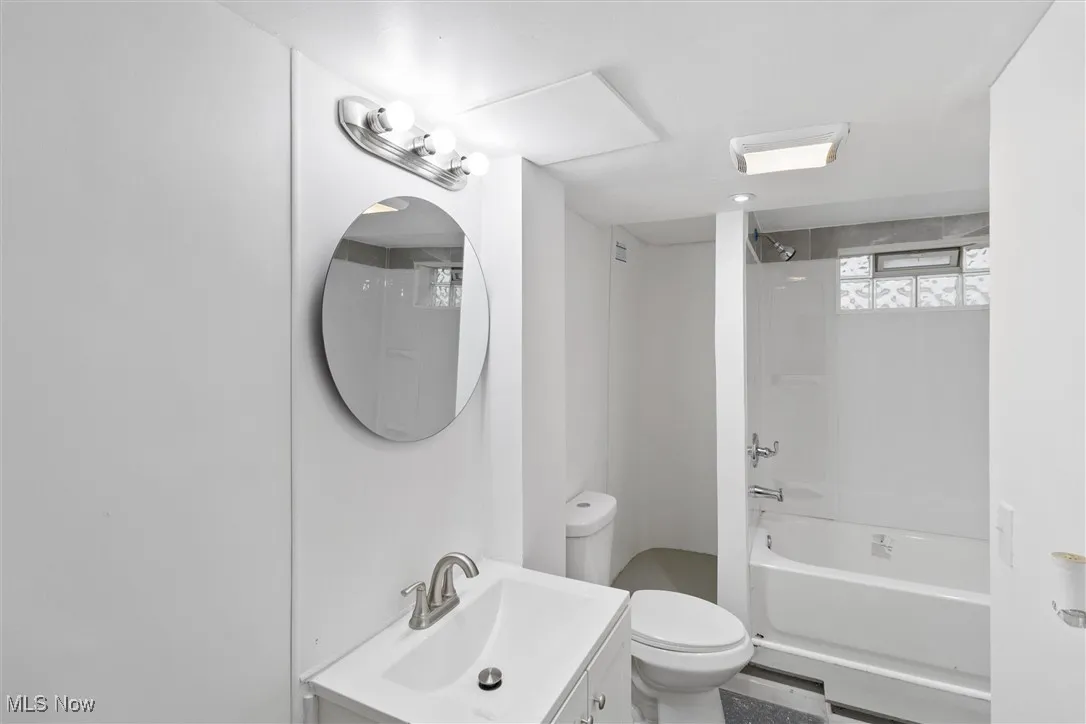 Full bath featuring bathtub / shower combination and vanity
