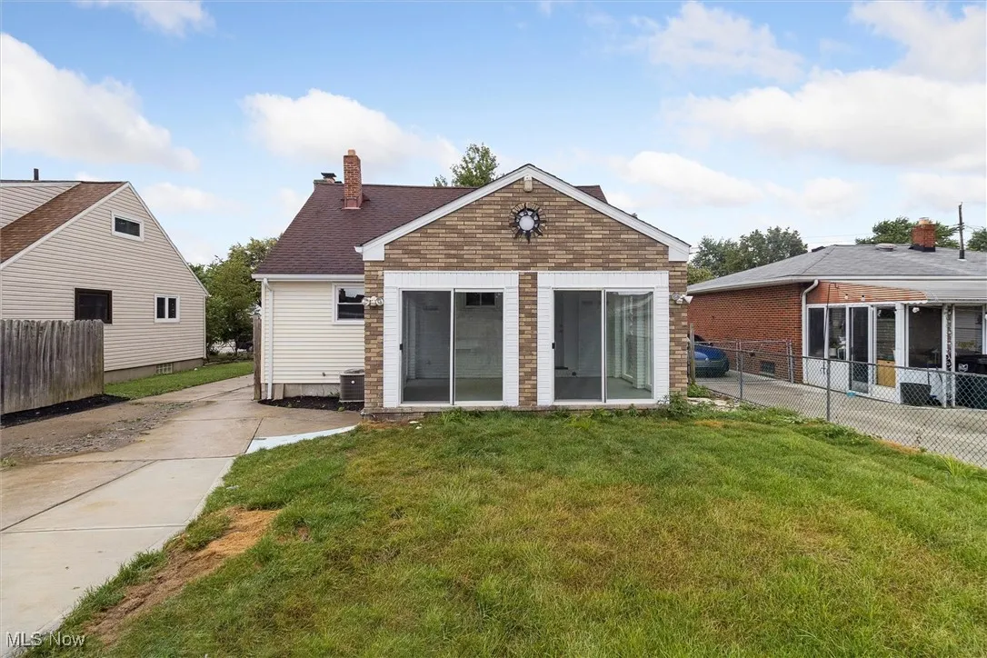 View of front of house featuring a chimney