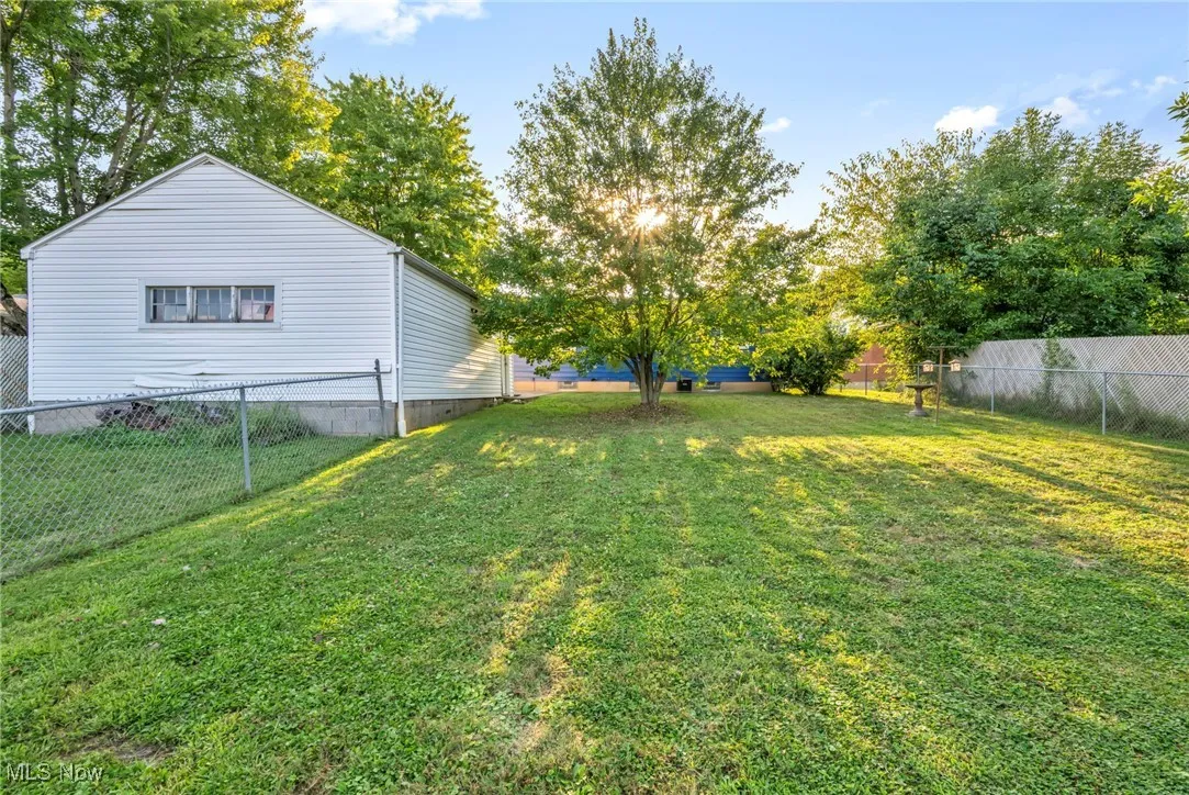 View of fenced backyard