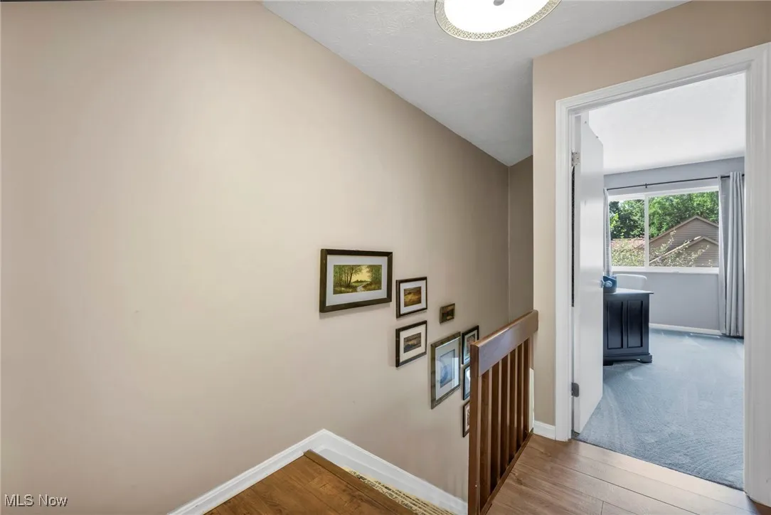 Upstairs hallway, Stairs to downstairs with updated flooring