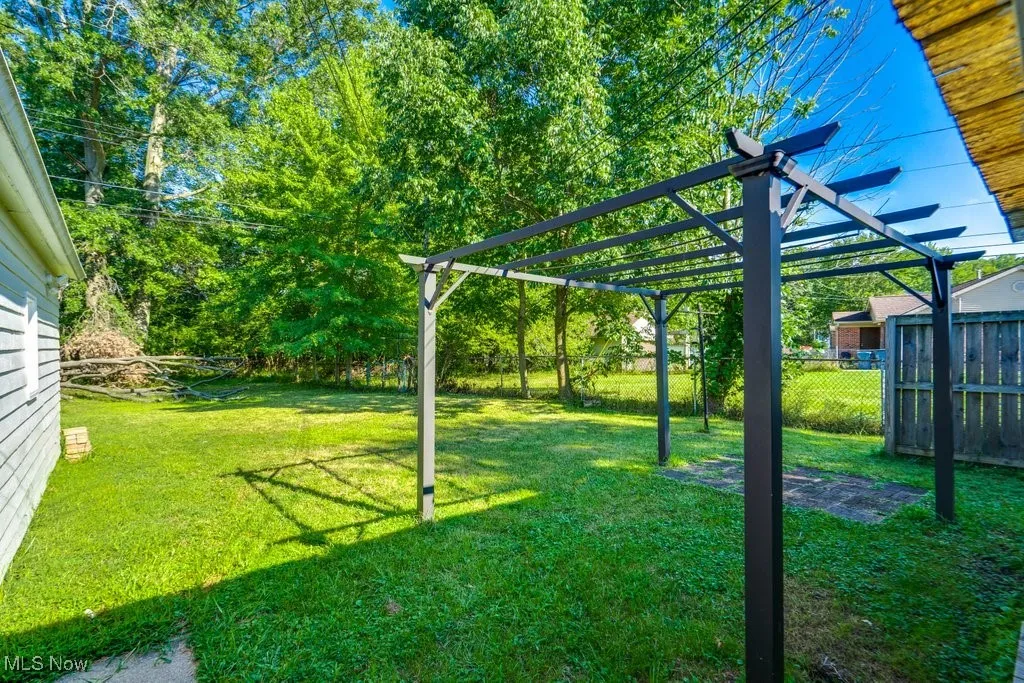 View of yard with a pergola