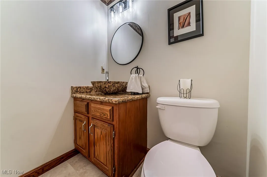 Bathroom with vanity and toilet