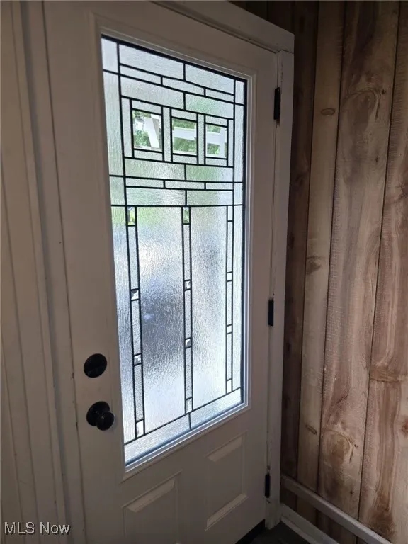 Beautiful Doorway featuring plenty of natural light
