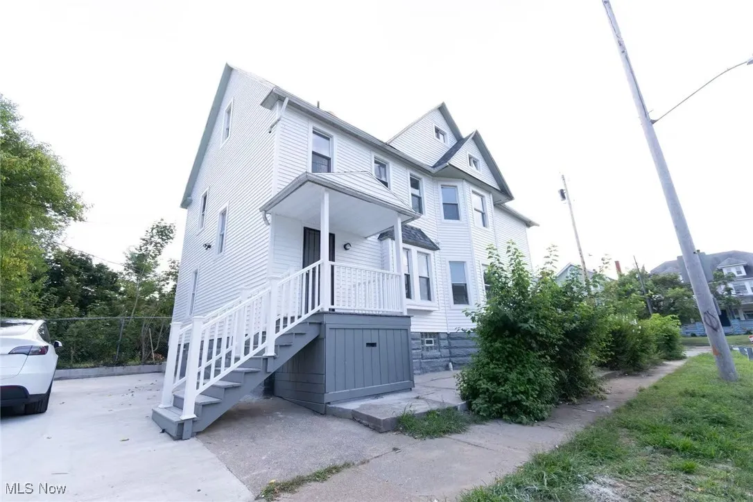 View of front of house with covered porch